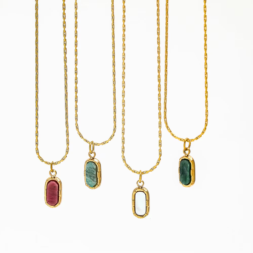 Aera gold pendant necklace detail by Lumé Lumé