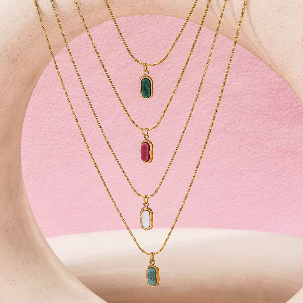 Aera gold pendant necklace detail by Lumé Lumé