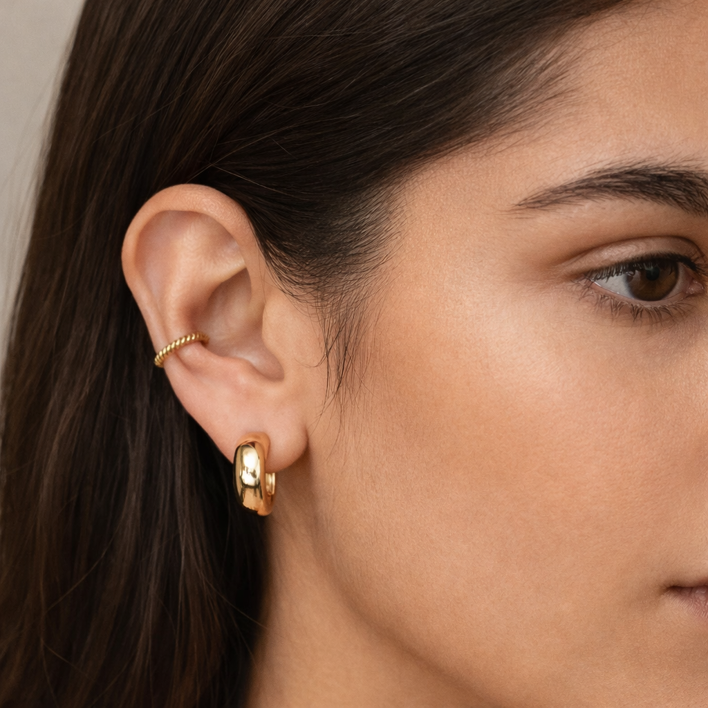 Aurelia Mini Hoops worn in a Lumé Lumé lifestyle image