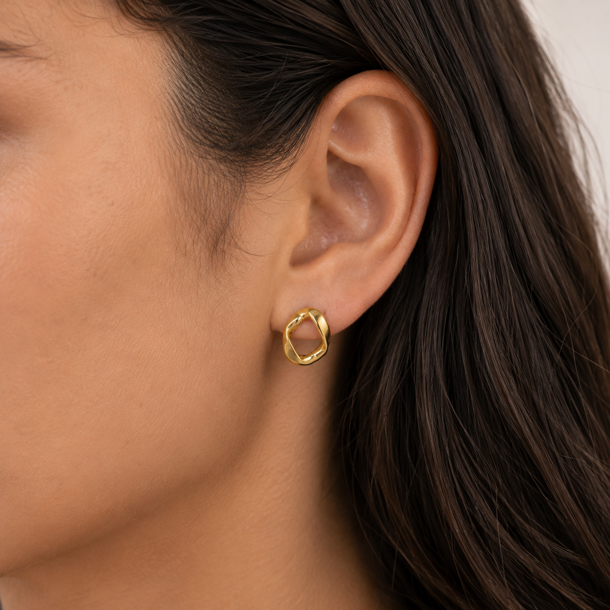 Aurora Hoops worn in a Lumé Lumé lifestyle image
