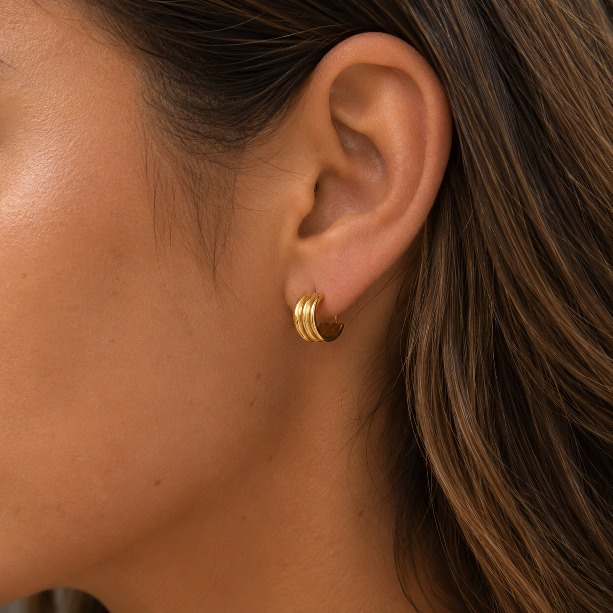 Celine Hoops worn in a Lumé Lumé lifestyle image