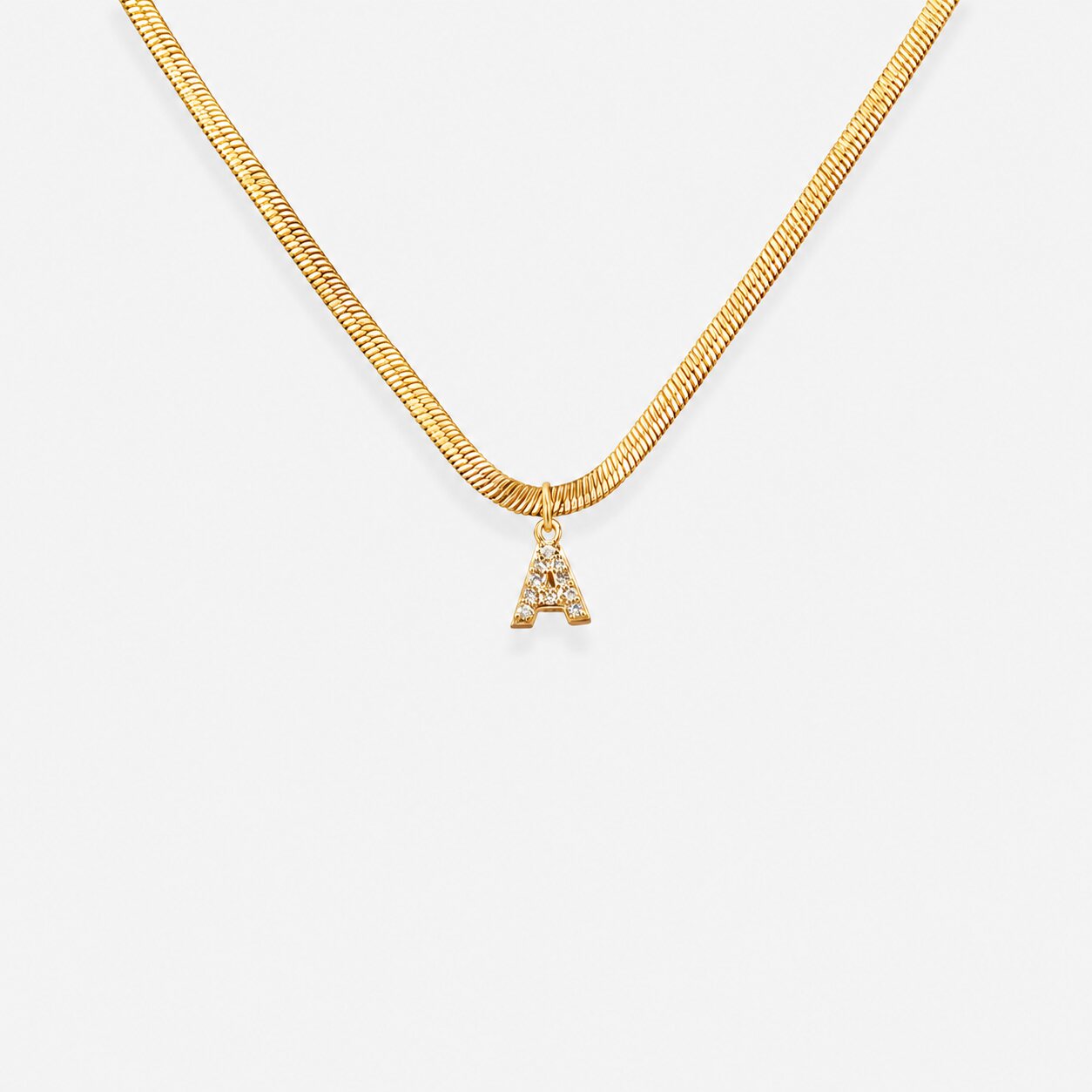 Elara A Initial Necklace gold letter pendant with clear stones by Lumé Lumé