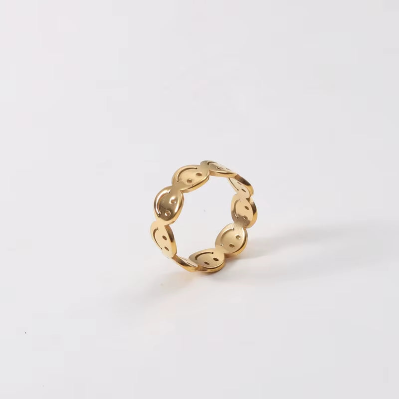 Joy Charm Ring gold smiley design detail by Lumé Lumé