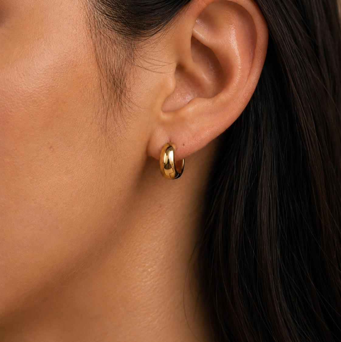 Lunette Hoops worn in a Lumé Lumé lifestyle image