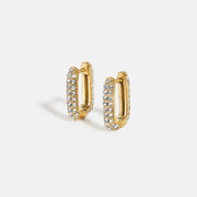 Lumé Pavé Huggies gold earrings with clear stones by Lumé Lumé