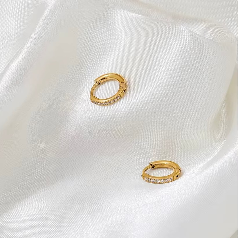 Serene Pavé Huggies gold and stone detail by Lumé Lumé