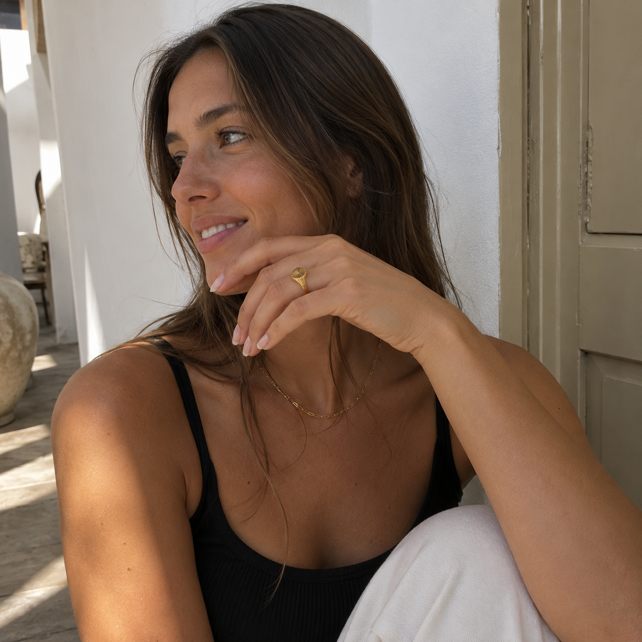 Serene Signet Ring worn in a Lumé Lumé lifestyle image