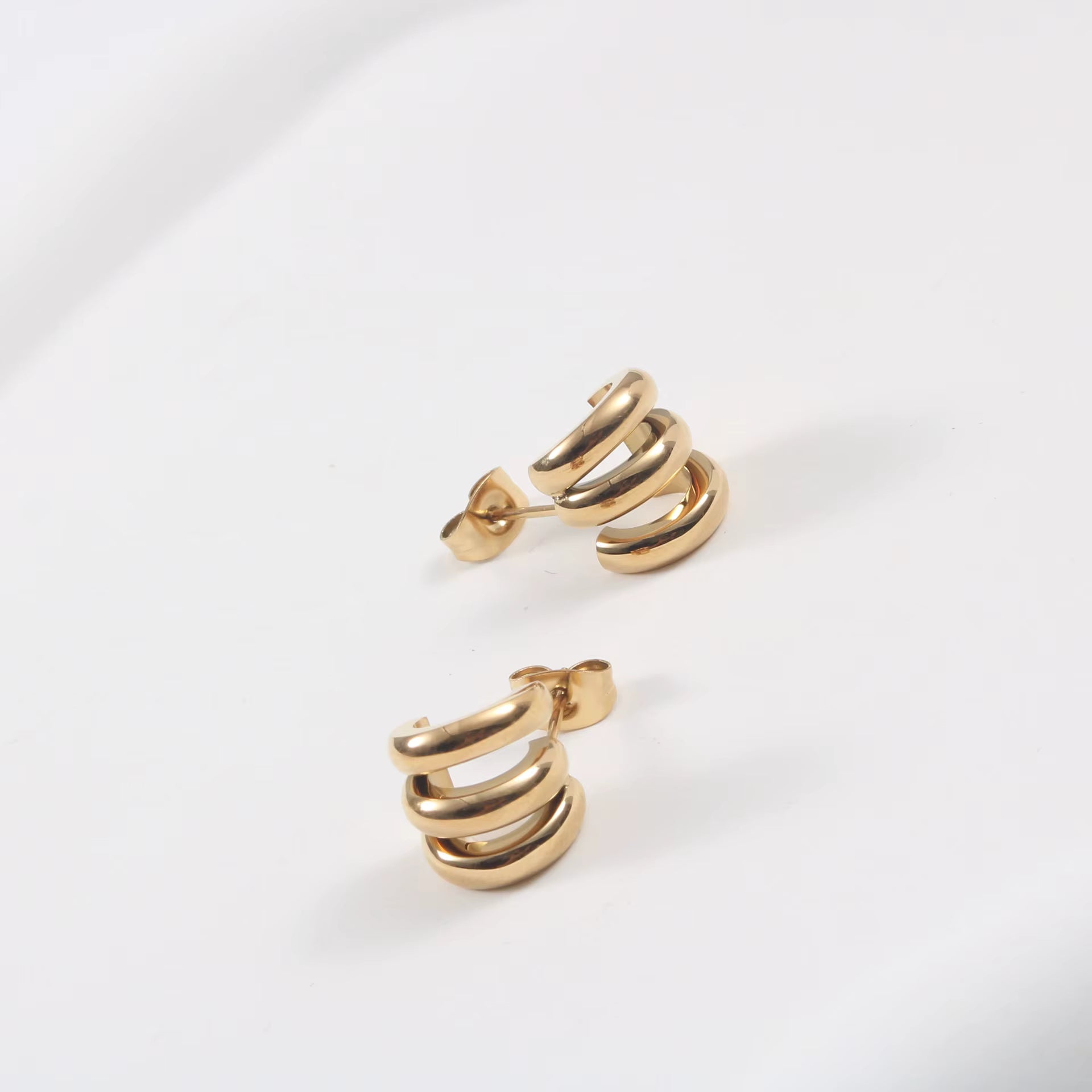 Sierra Hoops triple-band gold detail by Lumé Lumé