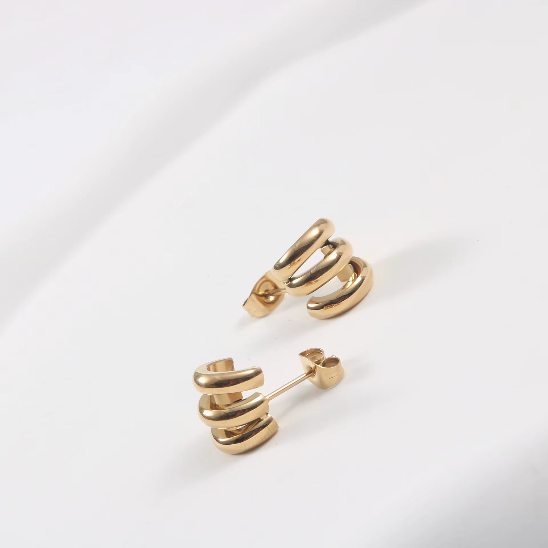 Sierra Hoops gold fastening detail by Lumé Lumé