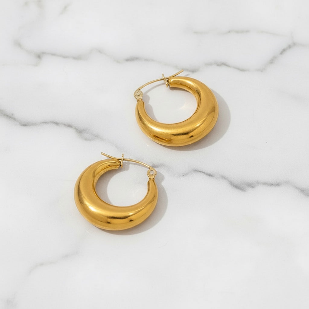 Solara Drop Hoops styled in a second Lumé Lumé lifestyle image