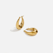 Solara Hoops sculptural teardrop gold earrings by Lumé Lumé