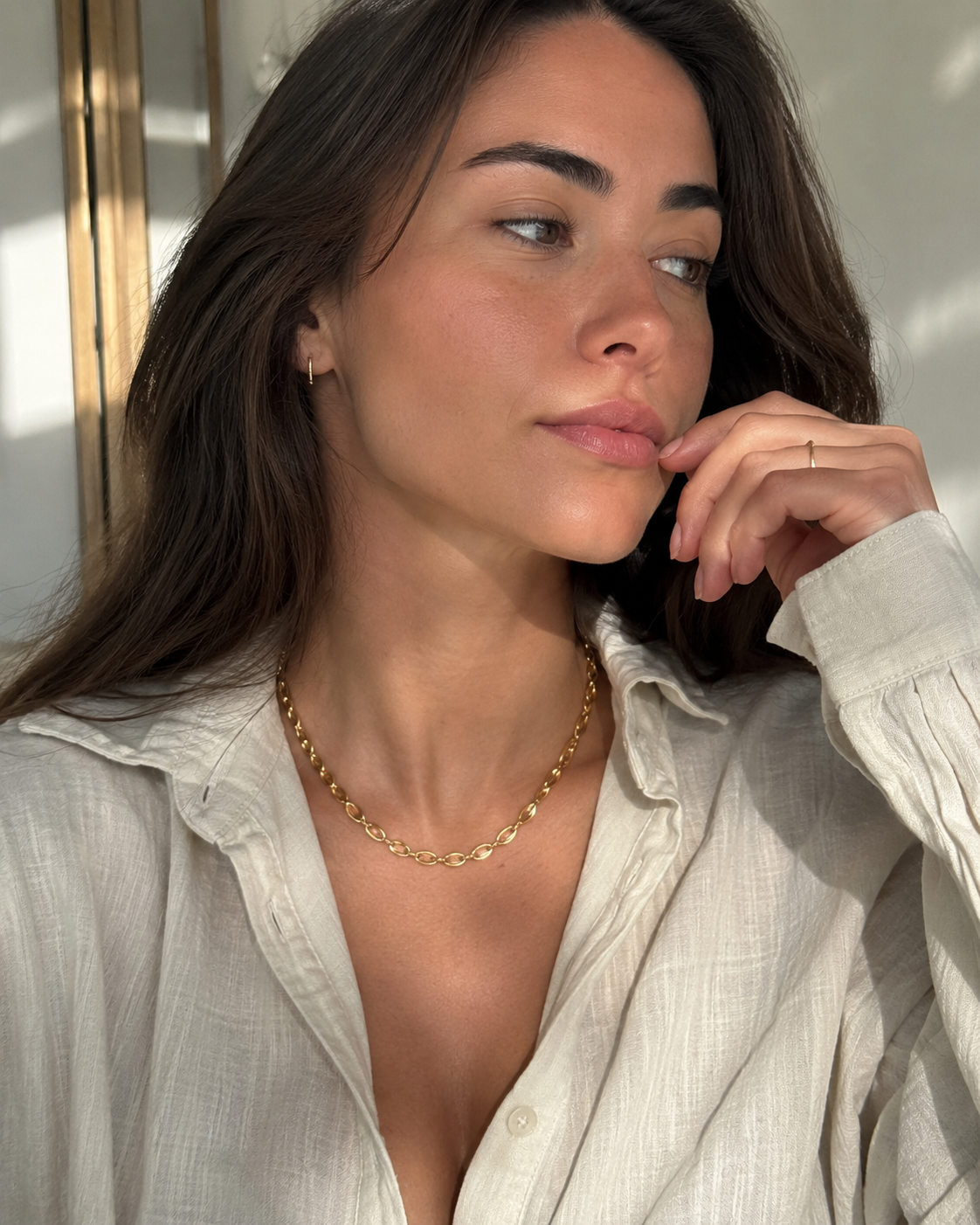 Soleil Chain worn in a Lumé Lumé lifestyle image